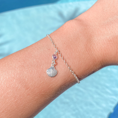 Pulseira concha com zircônia rosa na internet