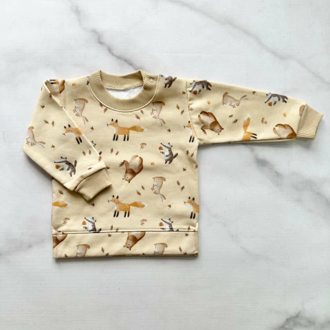 BUZO FRISADO ANIMALITOS BEIGE