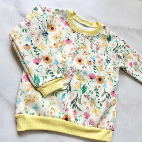 BUZO FRISADO FLORCITAS AMARILLO