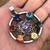 Dije Cubo De Metatron 3D 7 Chakras con piedras. - Amarrarte