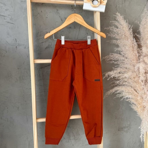 Calça moletom peluciada laranja ferrugem - Alakazoo