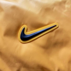 Nike Jaqueta Puffer Amarela X Drake NOCTA na internet