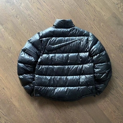 Nike Jaqueta Puffer Preta x Drake NOCTA na internet
