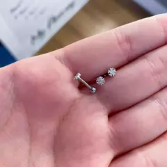 Piercing orelha floco de neve