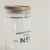 Frasco Redondo de Vidrio Acanalado con Tapa de Madera Acacia 1700ml en internet