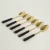Set de 6 cucharitas de Postre Línea Volos Dorado y negro - comprar online