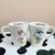Set de tazas cónicas DONALD Y DAISY LOVE BESO