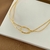 CHOKER DESIGN ENTRELAÇADO BANHO OURO 18K - comprar online