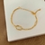 PULSEIRA DESIGN ENTRELAÇADO BANHO OURO 18K