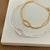PULSEIRA DESIGN ENTRELAÇADO BANHO OURO 18K - comprar online
