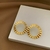 BRINCO CIRCULO VAZADO CHAPA BANHO OURO 18K