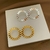 BRINCO CIRCULO VAZADO CHAPA BANHO OURO 18K - comprar online