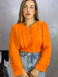 Camisa Elys na internet
