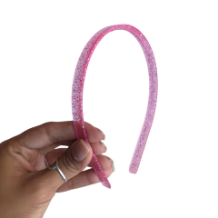 TIARA DE DENTINHO 10MM TRANSPARENTE ROSA PRINCESA COM GLITTER - DUZIA na internet