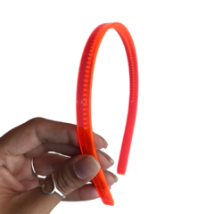 TIARA DE DENTINHO 10MM TRANSPARENTE LARANJA NEON - DUZIA na internet