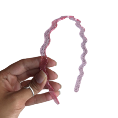 TIARA DE DENTINHO ONDULADA 10MM TRANSPARENTE ROSA BEBÊ COM GLITTER - DUZIA - comprar online