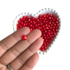 MIÇANGA ACRÍLICA BOLA SEXTAVADA VERMELHA TRANSPARENTE C/ MIOLO BRANCO (8MM) - 20 GRAMAS - comprar online