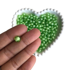 MIÇANGA ACRÍLICA BOLA SEXTAVADA VERDE TRANSPARENTE C/ MIOLO BRANCO (8MM) - 20 GRAMAS - comprar online