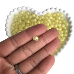MIÇANGA BOLINHA TRANSPARENTE COM MIOLO AMARELO (8MM) - 20 GRAMAS - comprar online