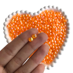 PÉROLA IRISADA COR LARANJA (6MM) - 20 GRAMAS - comprar online