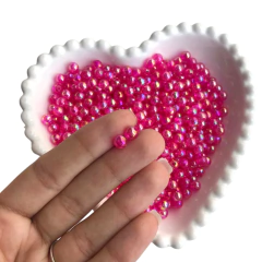 PÉROLA IRISADA COR PINK (6MM) - 20 GRAMAS - comprar online