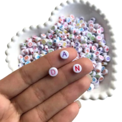 MIÇANGA LETRINHAS COLORIDA FUNDO BRANCO ARREDONDADO - 10 GRAMAS - comprar online