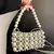 Bolsa Pearl na internet