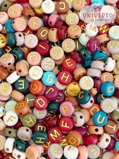 ENTREMEIO LETRAS DIVERSAS COM DOURADO COM 20 GRAMAS