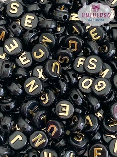 ENTREMEIO LETRAS PRETAS COM DOURADO COM 20 GRAMAS