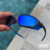Imagem do Óculos Juliet X-Metal Neon Blue + Pega Ladrão + Side Blinder