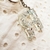 Chaveiro Letra Riri Prateado - comprar online
