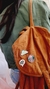 Broche No rain, no flower na internet