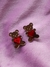 Brinco Fuzzy COM PEQUENO DEFEITO