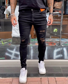 calça jeans super skinny all black levva rasgo no joelho - comprar online