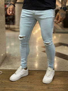 calça jeans super skinny clara lisa rasgo no joelho - comprar online