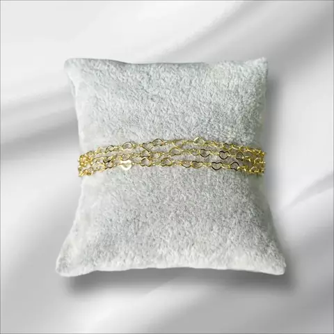 Pulseira tripla corações dourada