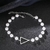 Pulseira Mini Pérolas Triângulo Aço Inox
