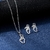 Conjunto Colar e Brincos Mãozinha Aço Inox