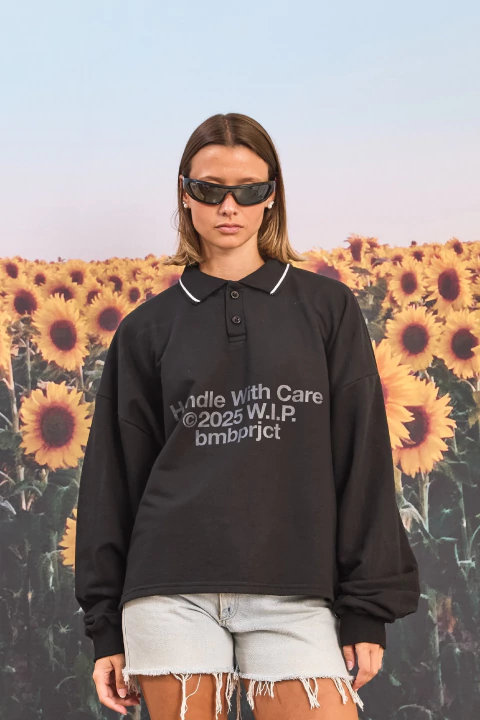 BUZO POLO NEGRO - HANDLE WITH CARE ®️ - comprar online