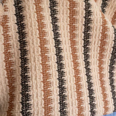 BAMBULA GLAPAGOS DE PUNTO NATURAL, MARRÓN CLARO Y NEGRO POR KILO en internet