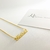 Colar Manuscrito - Banho de Ouro 18k.