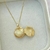 Imagem do Colar com 2 fotos relicário concha folheado a ouro 18k