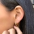 Brinco Argola click gota abaloada lisa banhada a ouro 18k M - comprar online