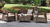 Conjunto de poltronas de jardim Corfu Marrom Keter com mesa de centro, composto por dois cadeirões e um sofá de dois lugares.