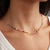 Choker Cristais Coloridos e Bolinhas de Prata Solara na internet