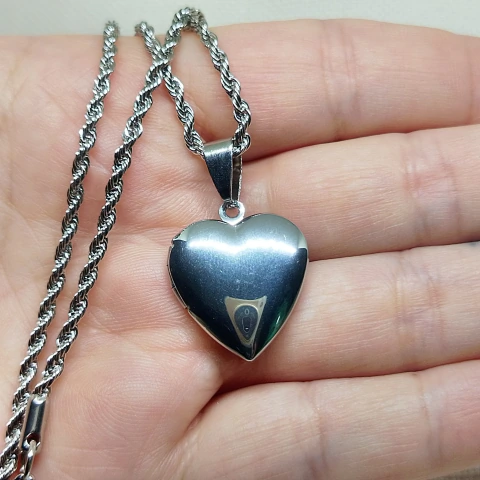 Conjunto corazón relicario