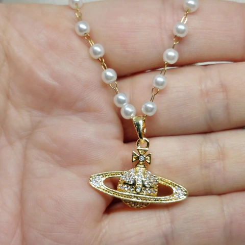 Collar Saturno con perlas