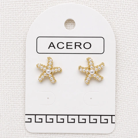 Estrella de mar con mini perlas acero dorado