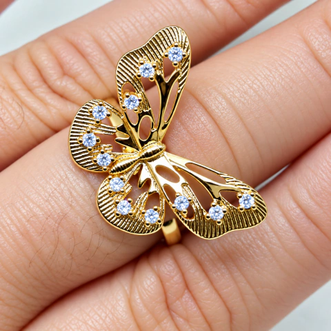 Anillo extensible mariposa con strass dorado