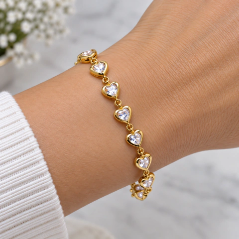 Pulsera con corazones de 8 mm dorado